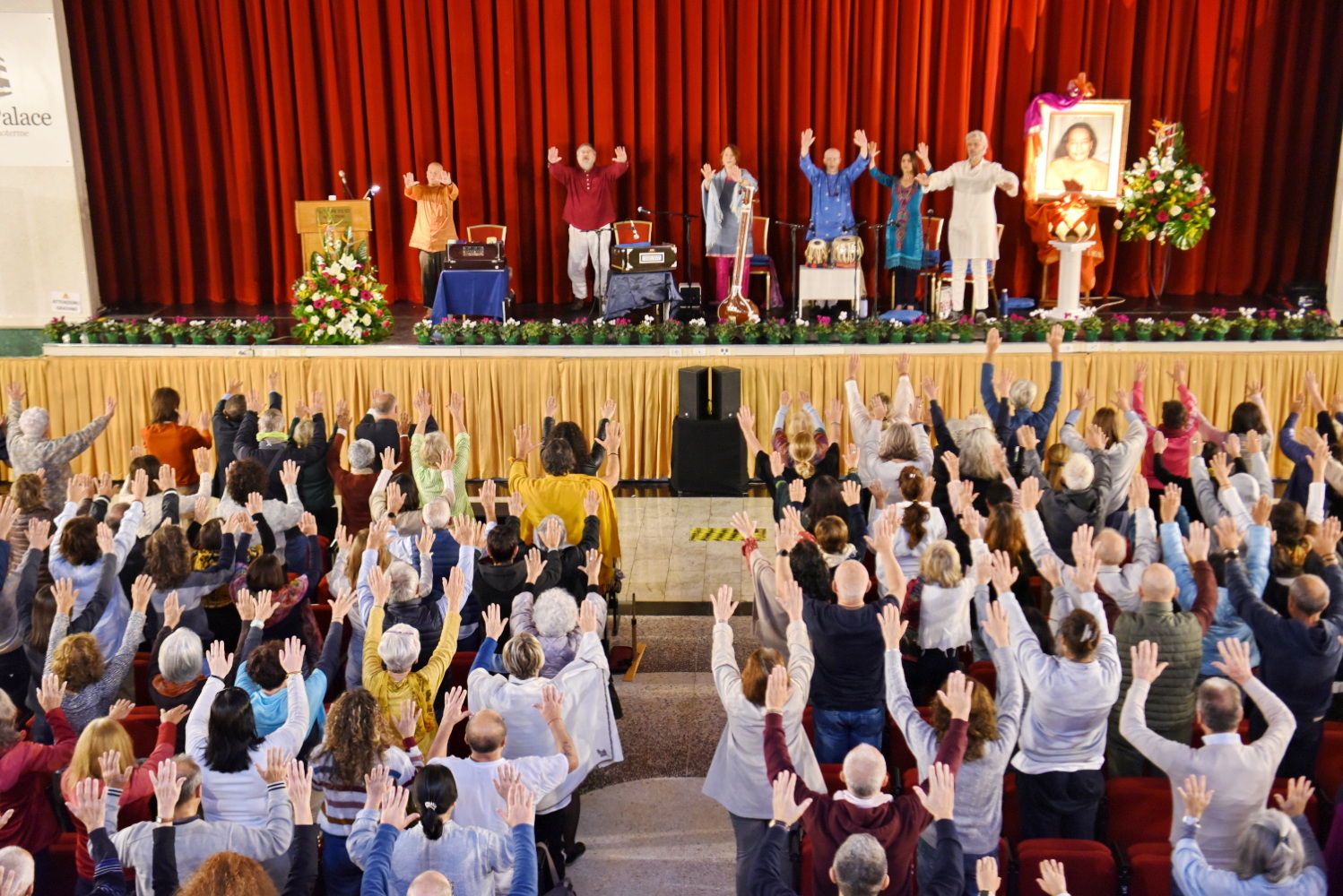 After a meditation with kirtan (devotional chanting), Brother Vajrananda leads participants in Paramahansa Yogananda's healing technique.