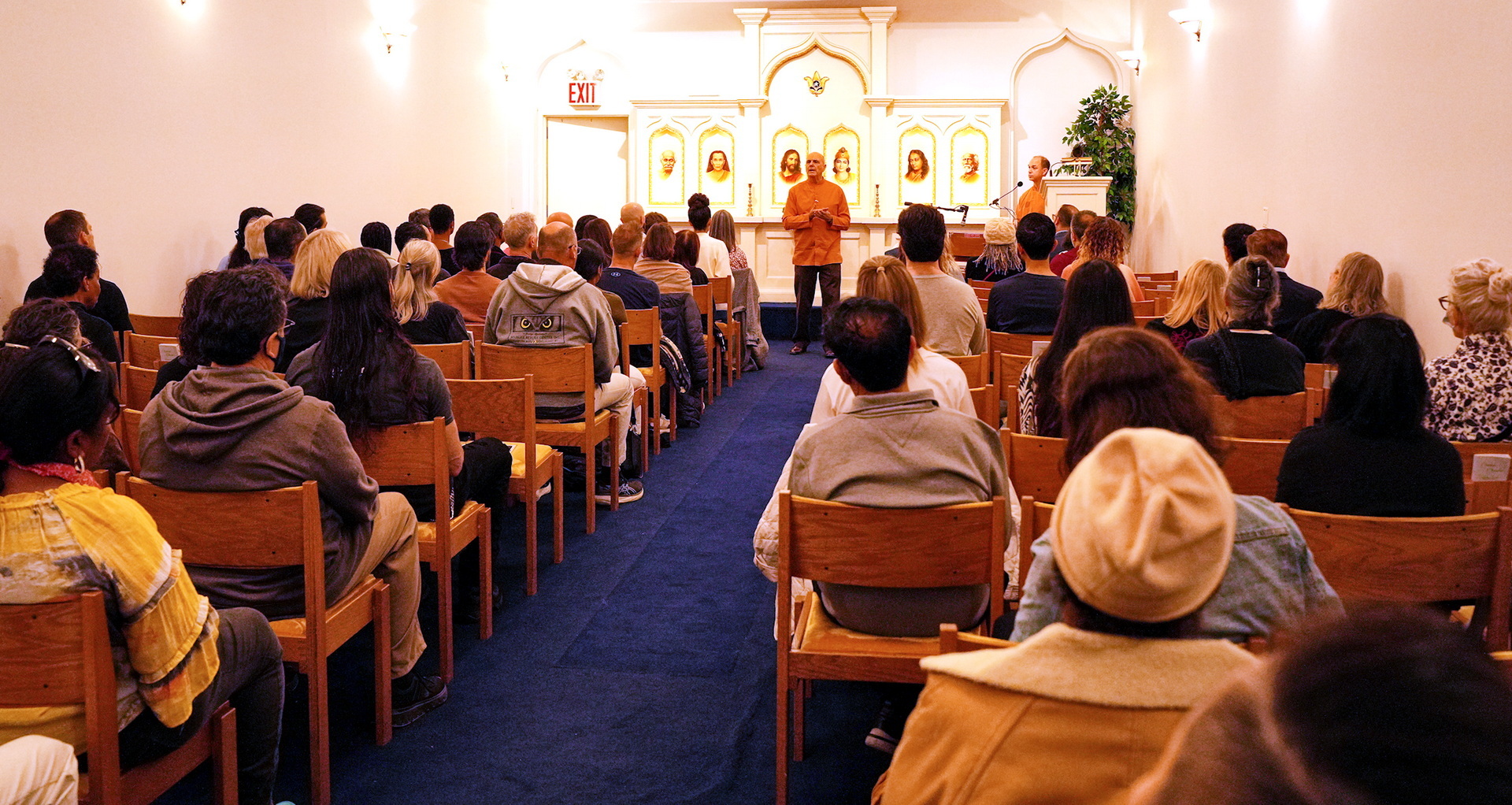 Brother Devananda speaks to members at the SRF New York City Center.
