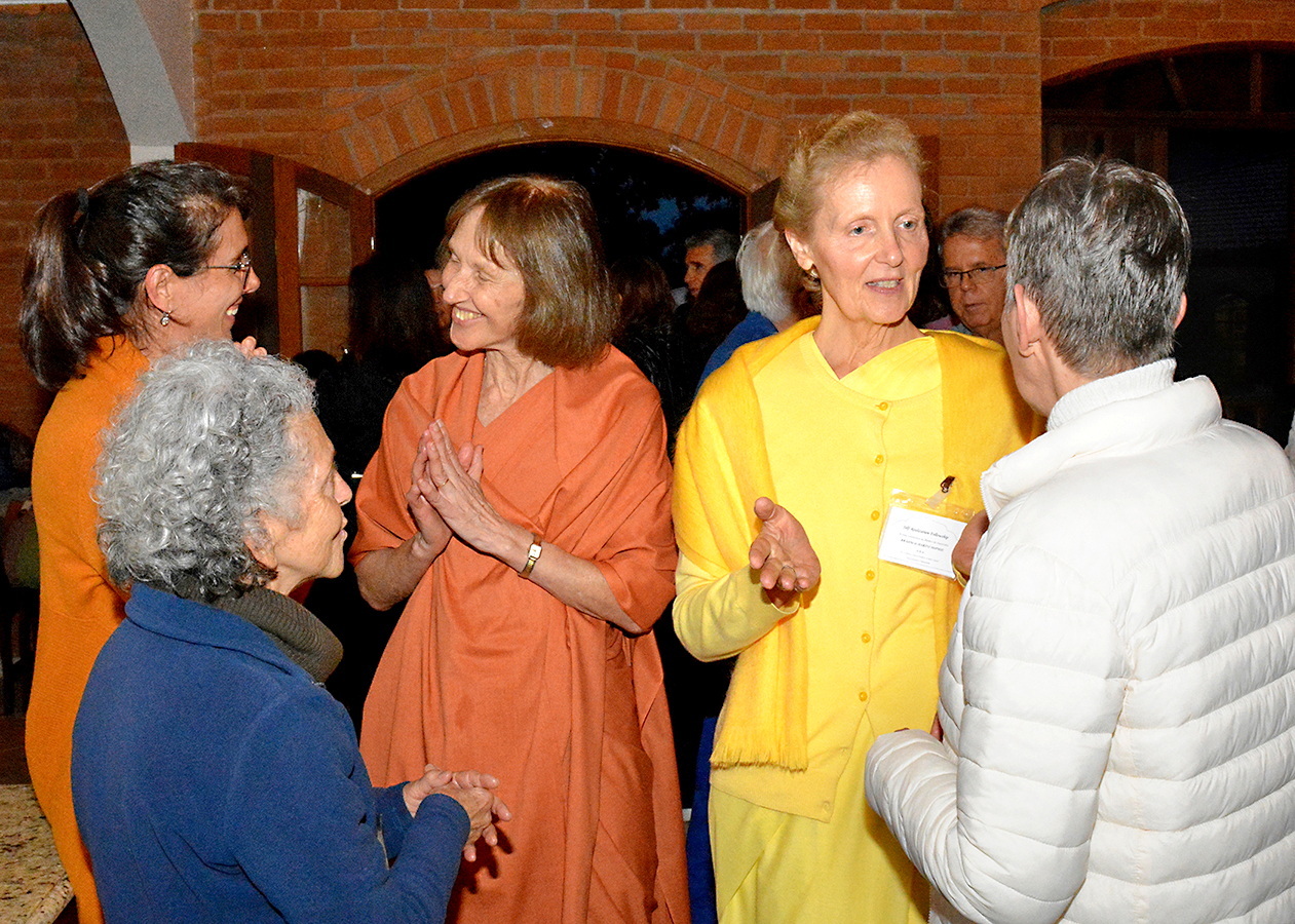 The nuns greet devotees at the opening of the retreat program.