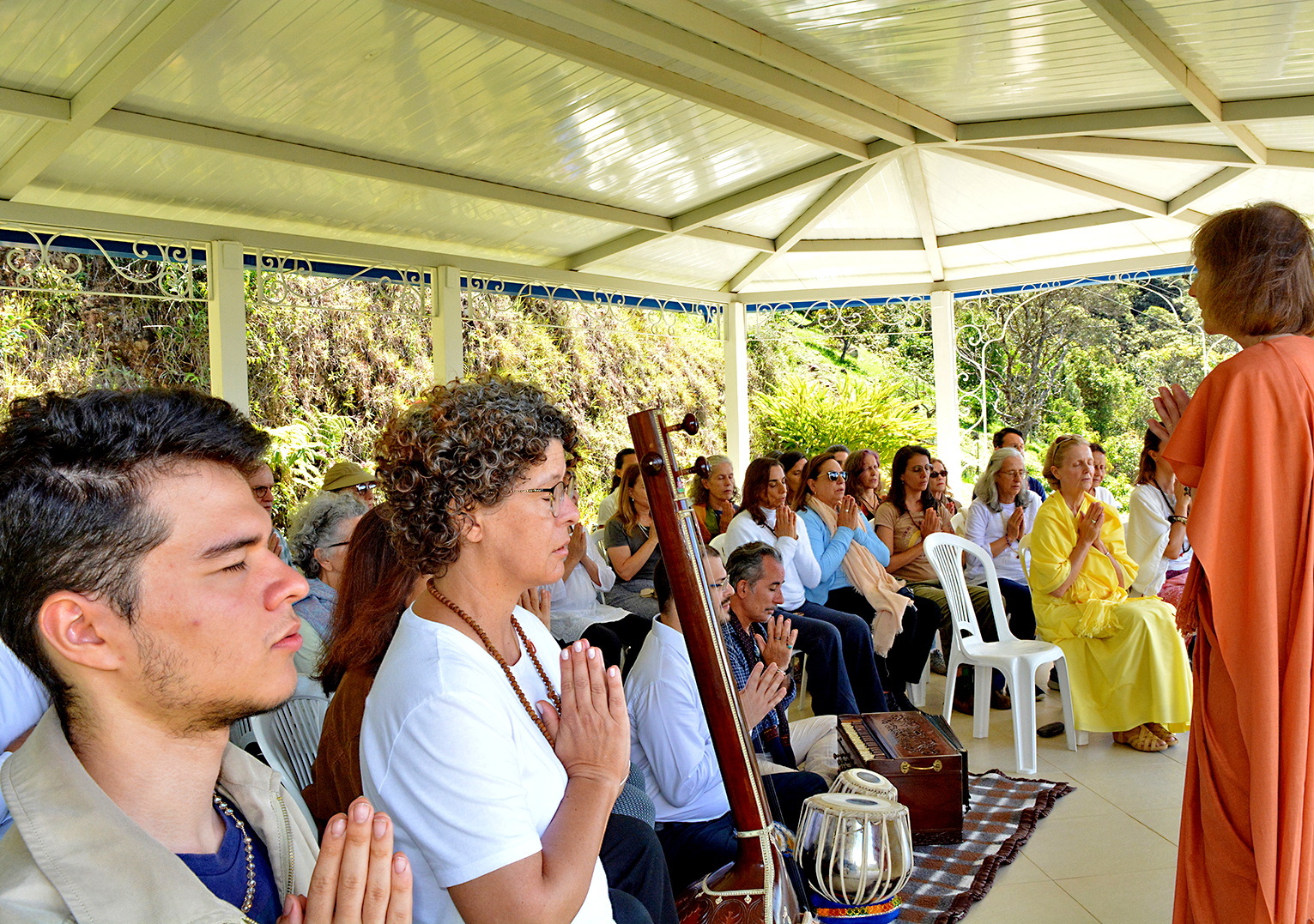 Sister Bhavani leads a devotional prayer.